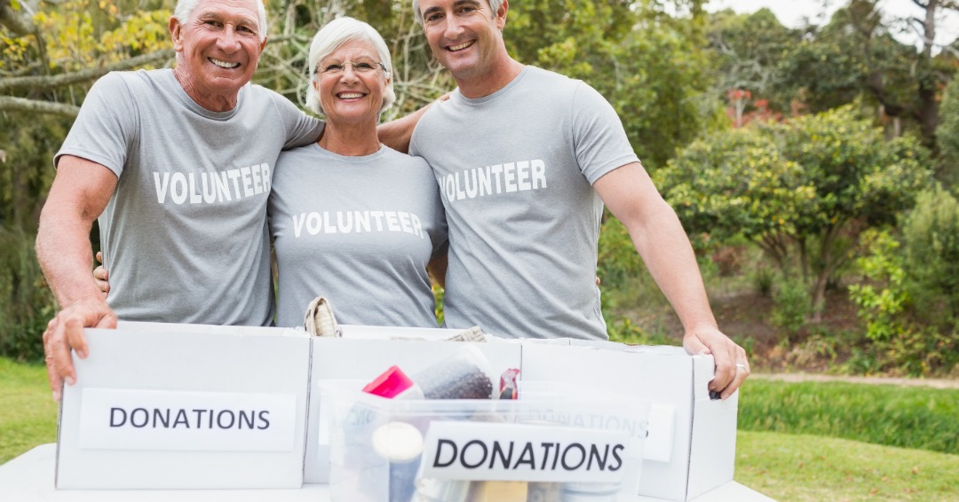 retirees with grey volunteering shirts collecting donations